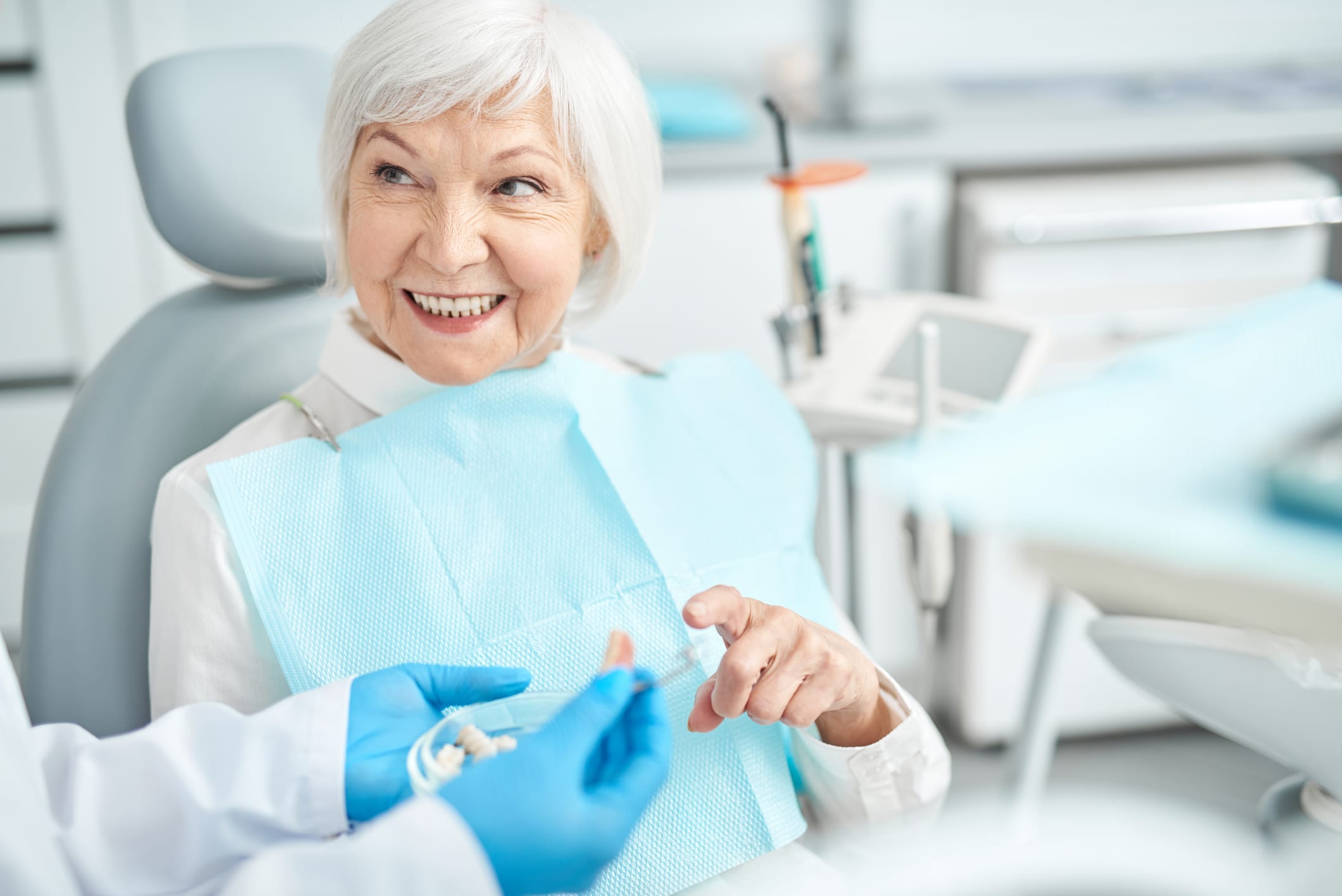woman smiling at dentist office